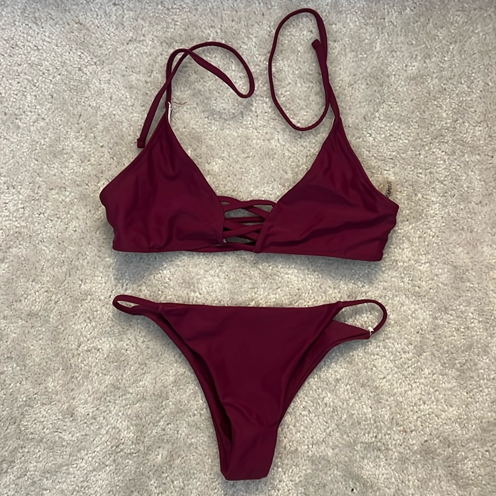 Strappy ZAFUL swimsuits- size small; deep magenta color